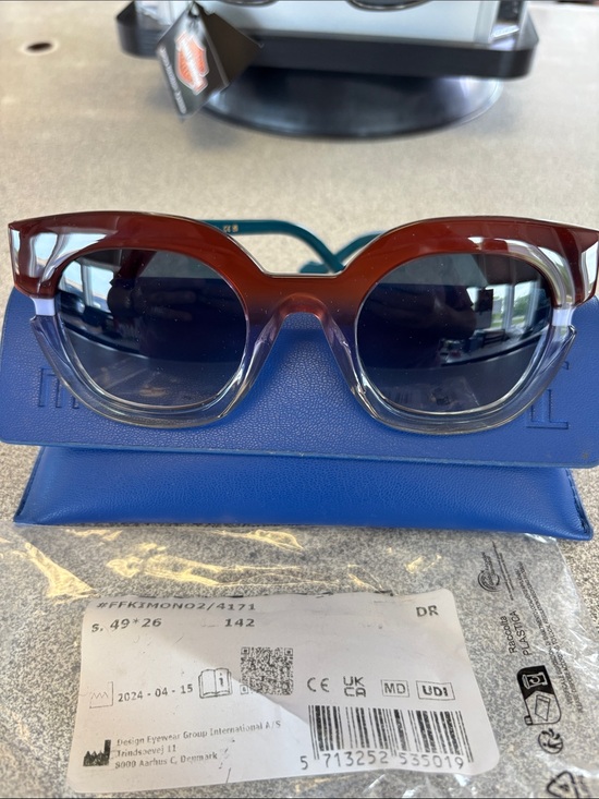 Face A Face Accessories - Women’s Two-Tone Brown to Clear Sunglasses with Blue Temples